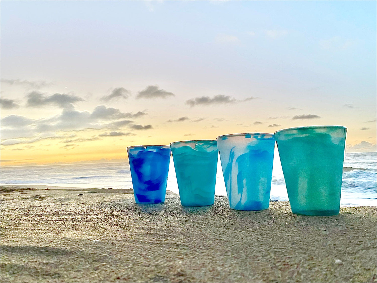 Shatterproof Calypso Blue silicone wine cups designed for outdoor gatherings.